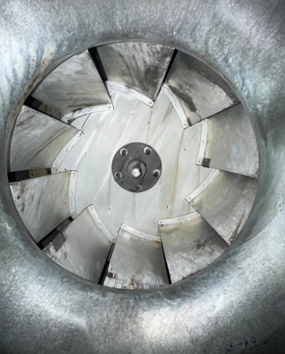Clean commercial kitchen exhaust fan blades.